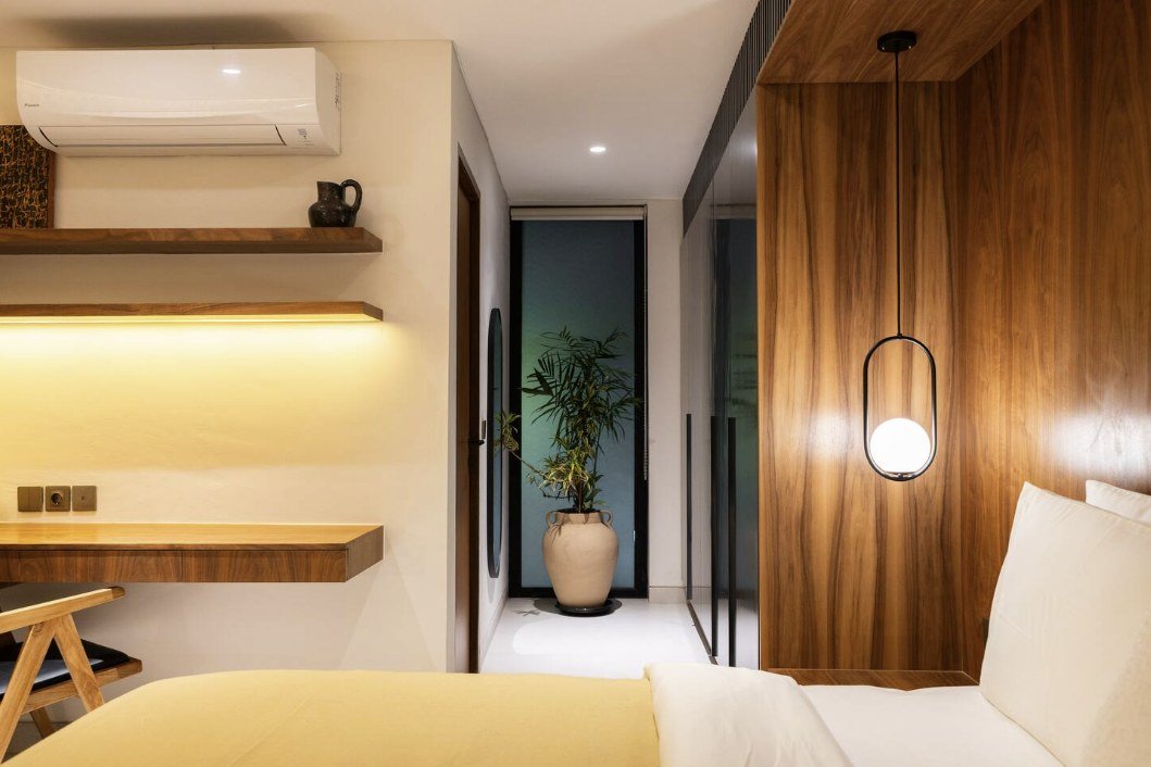 Master Bedroom with built-in desk and walk-in wardrobe
